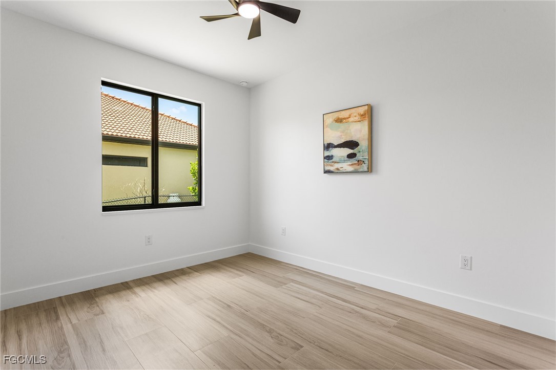 2702 Old Burnt Store Road North Cape Coral, FL 33993 - Photo 36 of 44 an empty room with a window