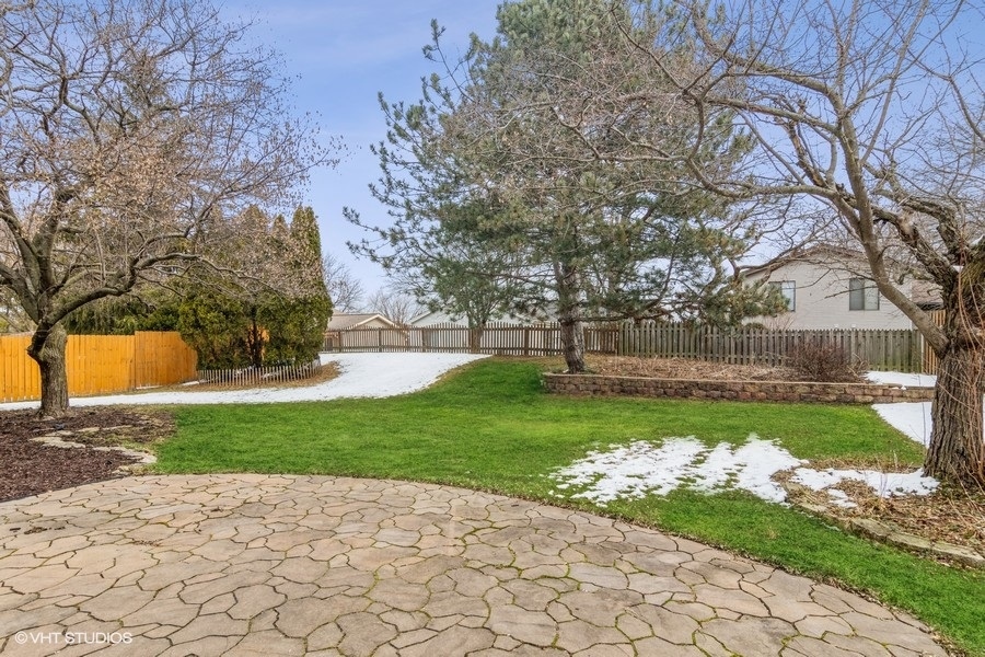 309 North Oltendorf Road Streamwood, IL 60107 - Photo 11 of 11 a view of backyard with a garden and trees