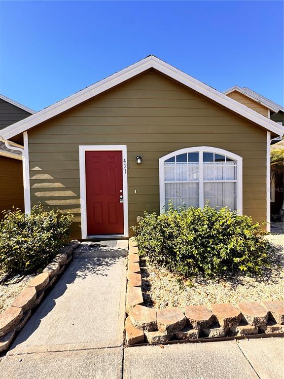 a front view of house with yard