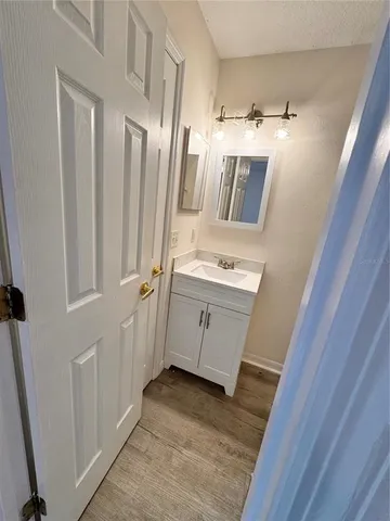 a view of a kitchen from the closet