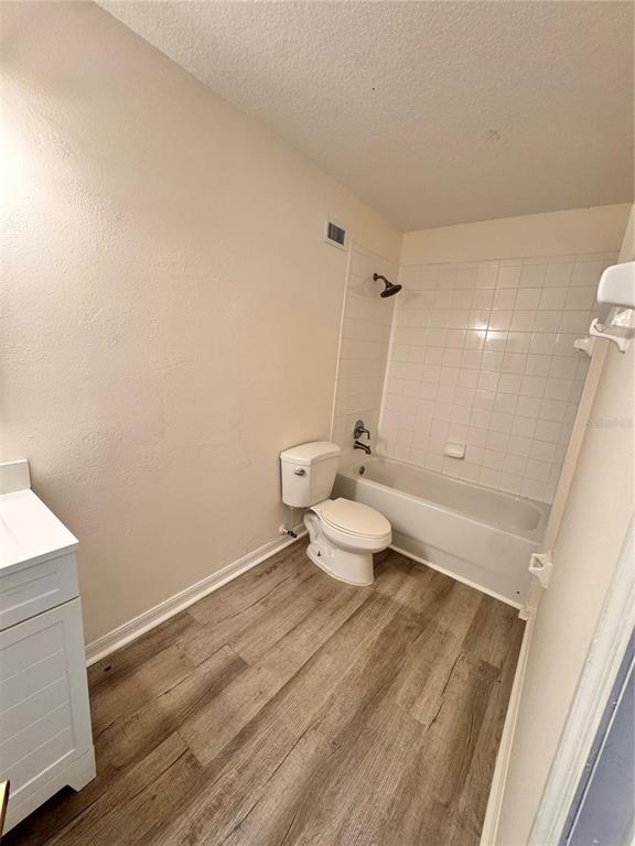421 Australian Way Davenport, FL 33897 - Photo 14 of 14 a bathroom with a sink and a toilet