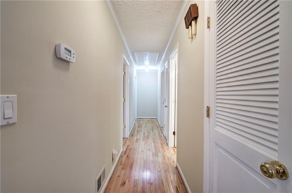 408 Mac Johnson Road Northwest Cartersville, GA 30121 - Photo 27 of 62 a view of a hallway with wooden floor