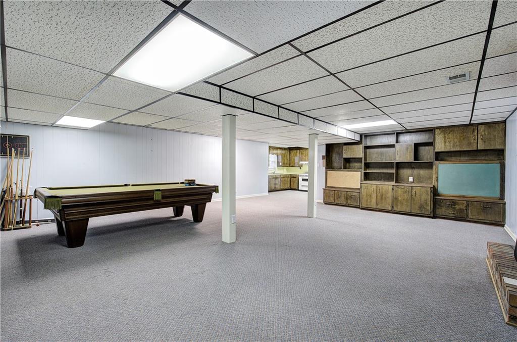 408 Mac Johnson Road Northwest Cartersville, GA 30121 - Photo 41 of 62 a room with lots of furniture and a wooden floors