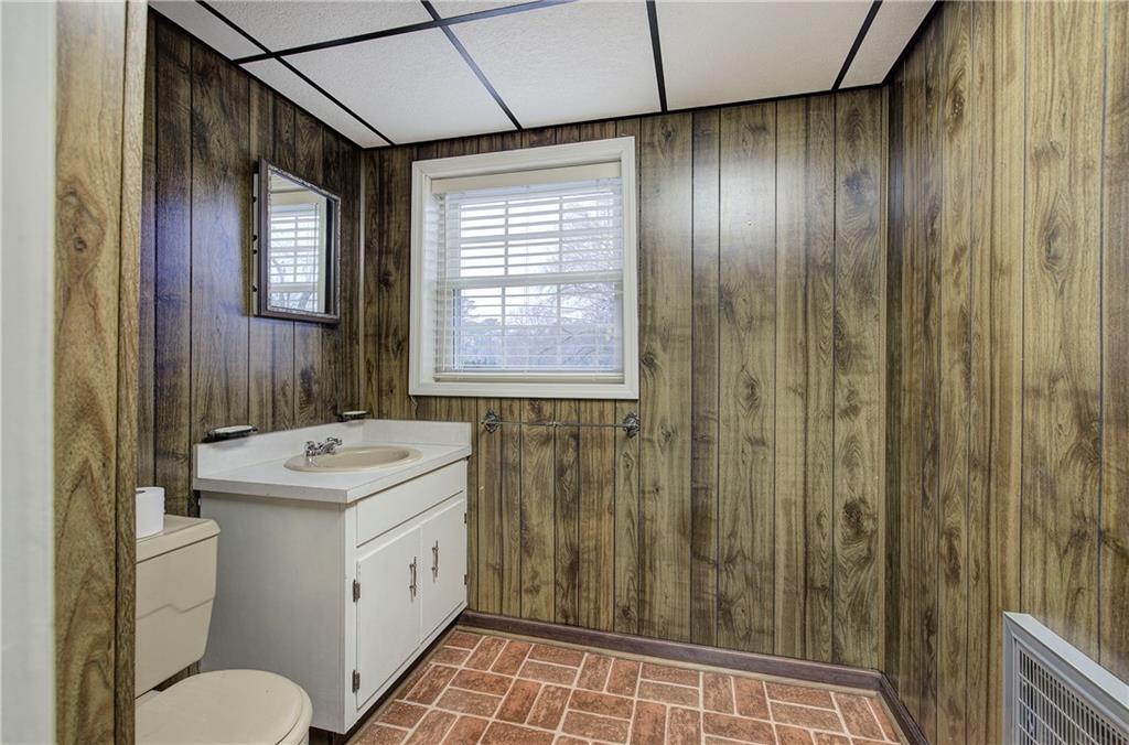 408 Mac Johnson Road Northwest Cartersville, GA 30121 - Photo 47 of 62 a bathroom with a sink a toilet and shower