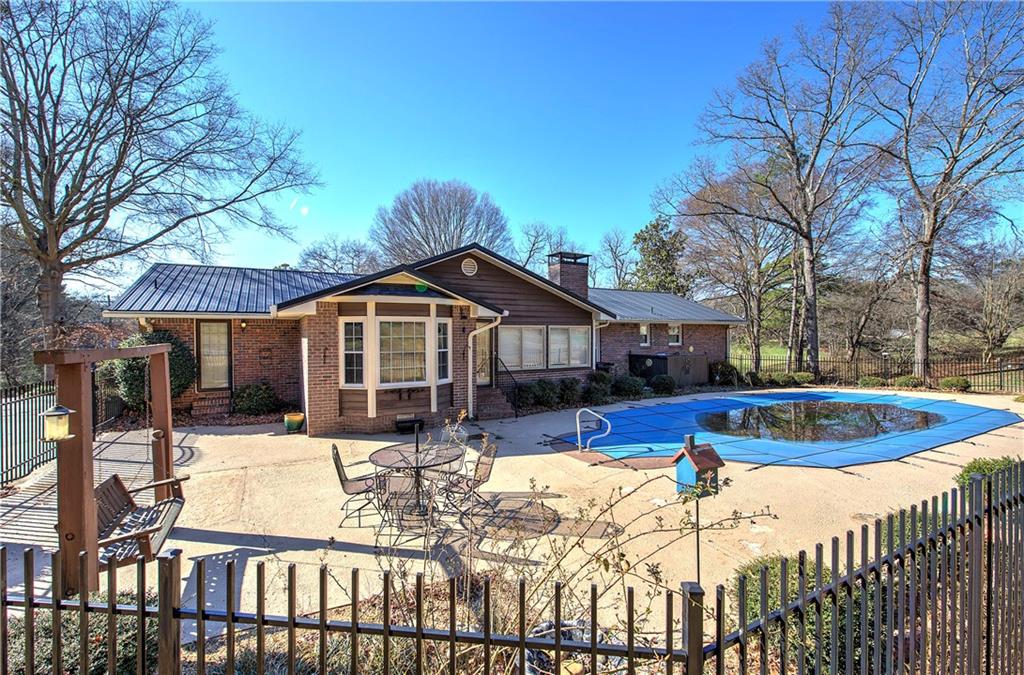 408 Mac Johnson Road Northwest Cartersville, GA 30121 - Photo 58 of 62 a view of a house with snow on the ground