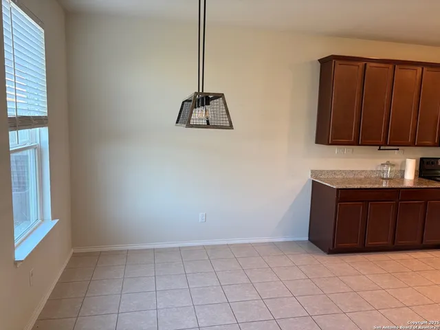a kitchen with a cabinets and a sink