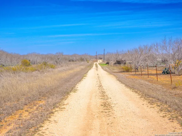 a view of lake with mountains in the background
