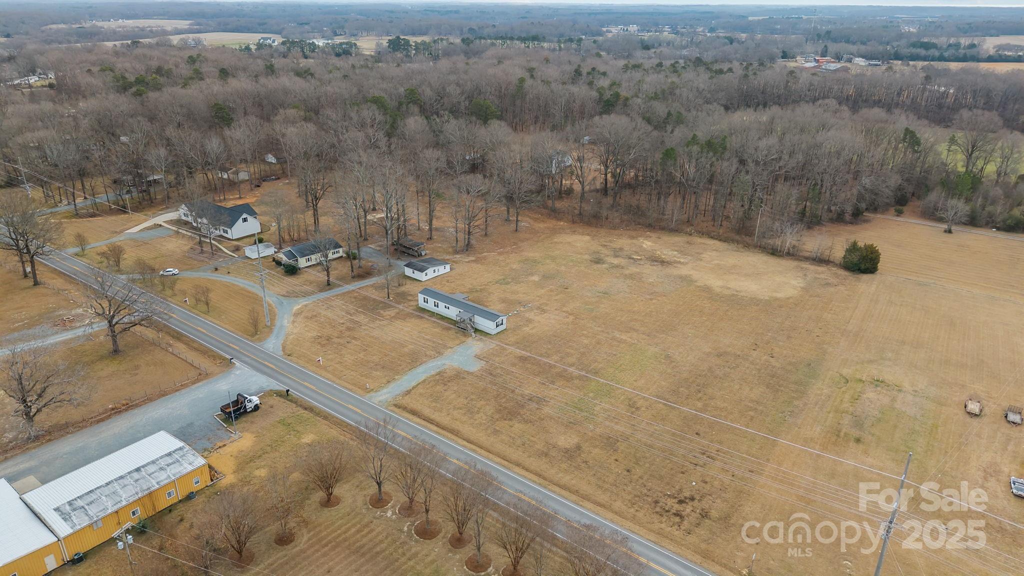 2909 New Town Road Monroe, NC 28110 - Photo 26 of 31 a view of a backyard of a house