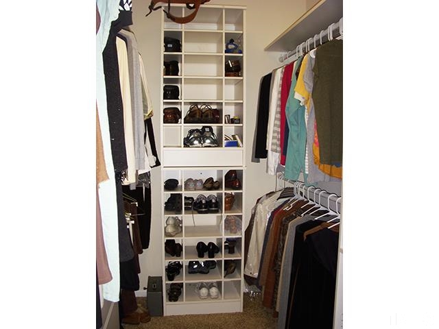 3809 Cathedral Bell Road Raleigh, NC 27614 - Photo 14 of 25 a view of walk in closet with clothes and shoes