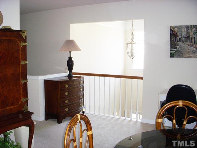 3809 Cathedral Bell Road Raleigh, NC 27614 - Photo 19 of 25 a living room with furniture and a window