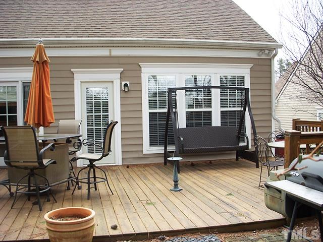 3809 Cathedral Bell Road Raleigh, NC 27614 - Photo 22 of 25 a view of a living room and a wooden floor