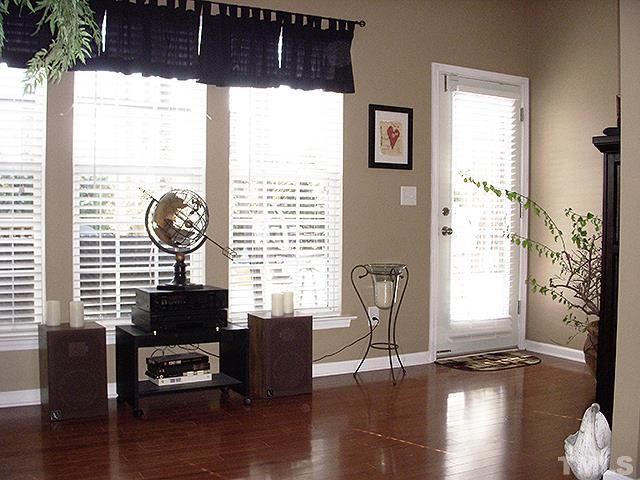 3809 Cathedral Bell Road Raleigh, NC 27614 - Photo 5 of 25 a view of a livingroom with furniture and a window