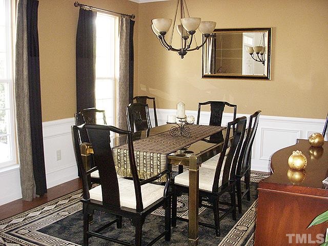 3809 Cathedral Bell Road Raleigh, NC 27614 - Photo 6 of 25 a view of a dining room with furniture and window