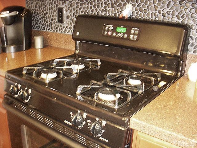 3809 Cathedral Bell Road Raleigh, NC 27614 - Photo 10 of 25 a close view of stove