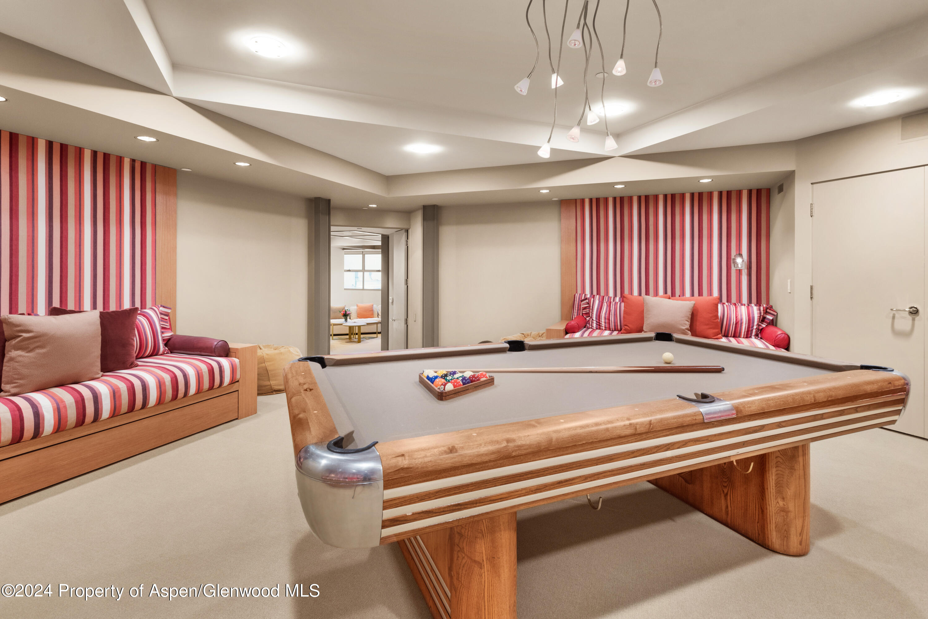 821 Cluny Road Aspen, CO 81611 - Photo 18 of 42 a room with furniture pool table and windows