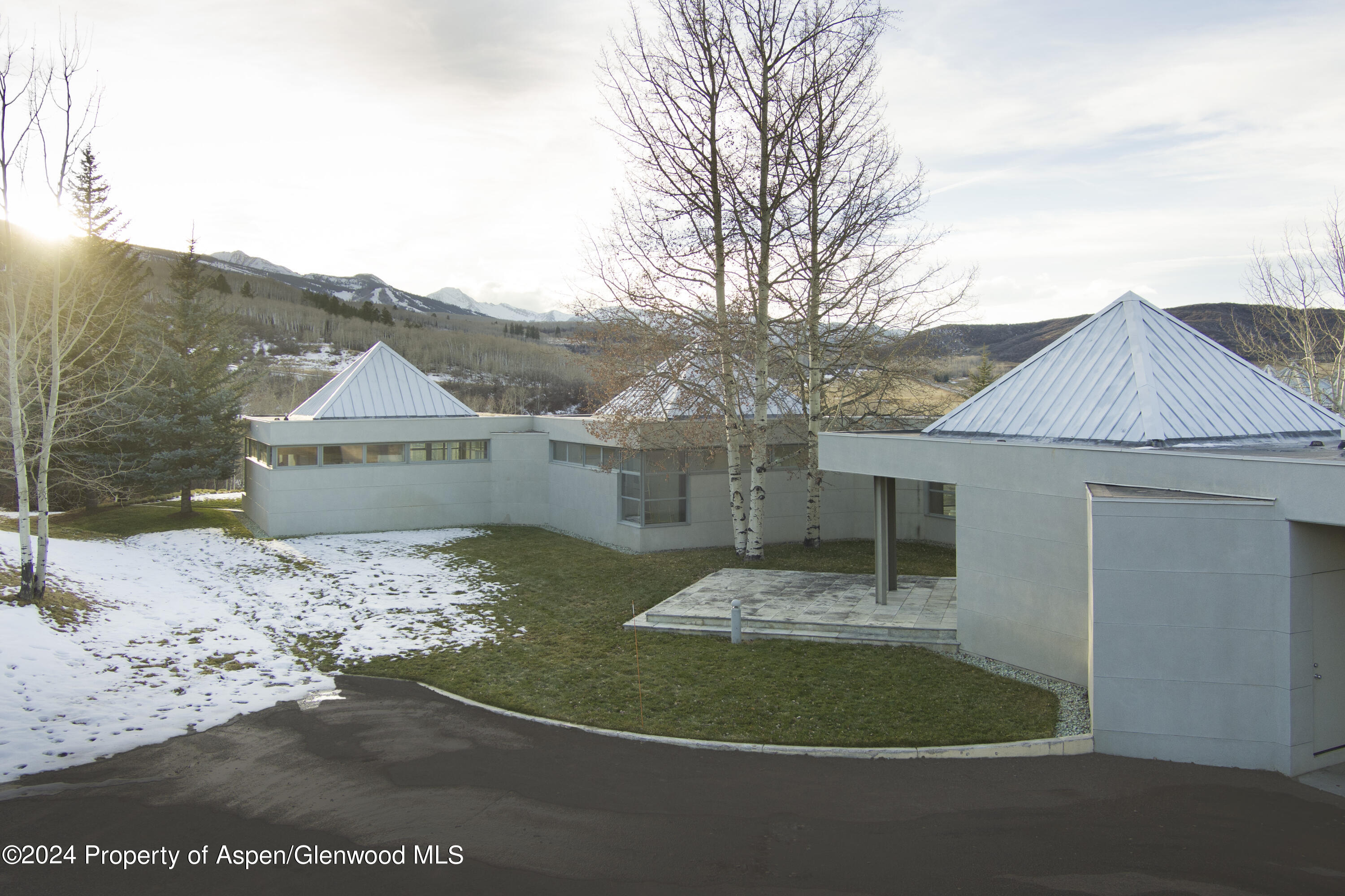 821 Cluny Road Aspen, CO 81611 - Photo 37 of 42 a view of a house with a yard