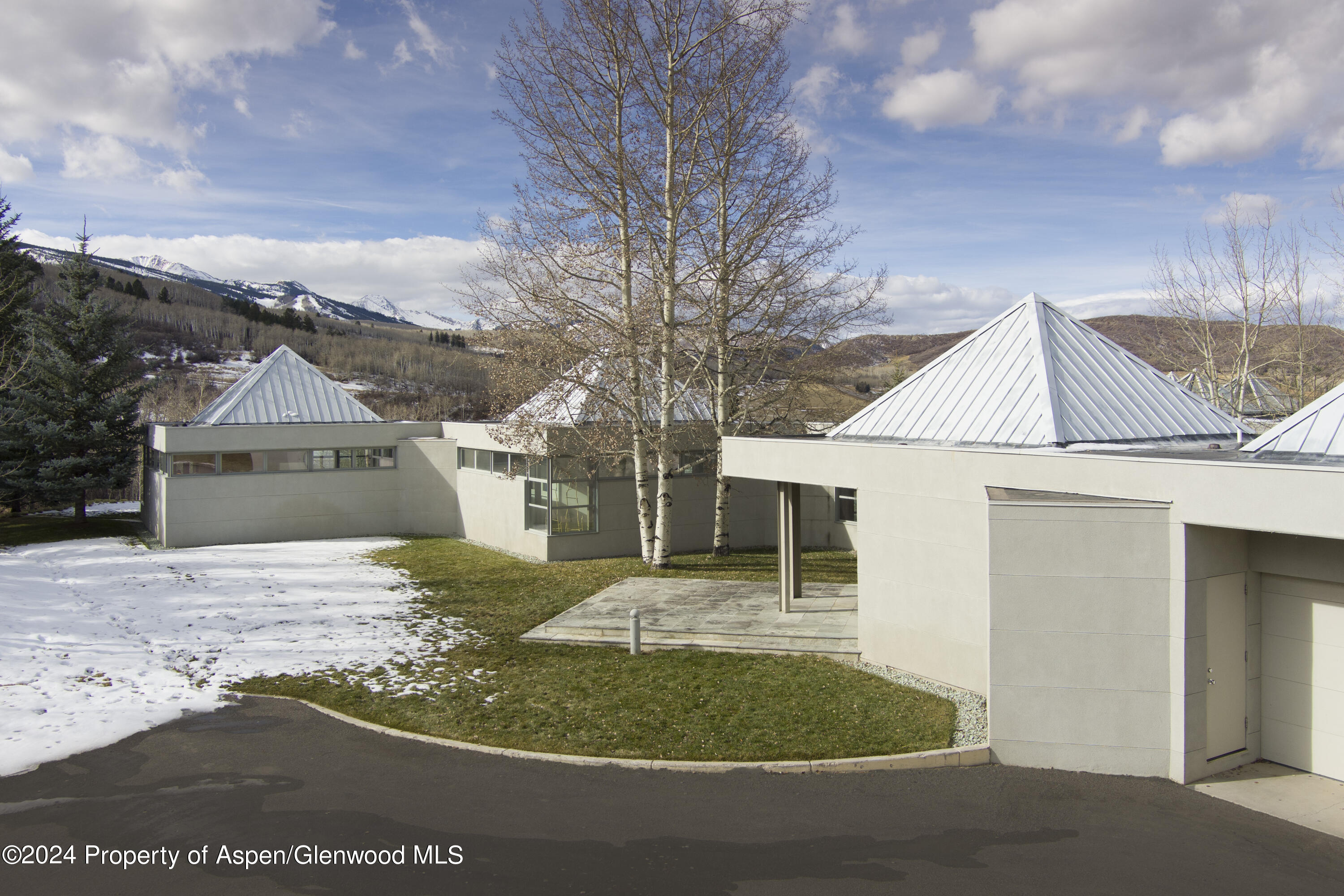 821 Cluny Road Aspen, CO 81611 - Photo 40 of 42 front view of house with a yard