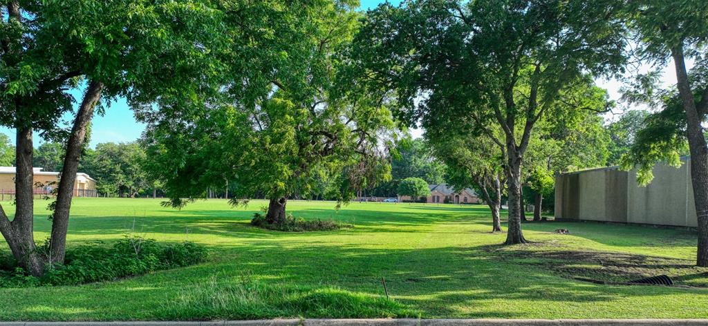 723 East Main Street Lancaster, TX 75146 - Photo 11 of 11 a view of a park with large trees