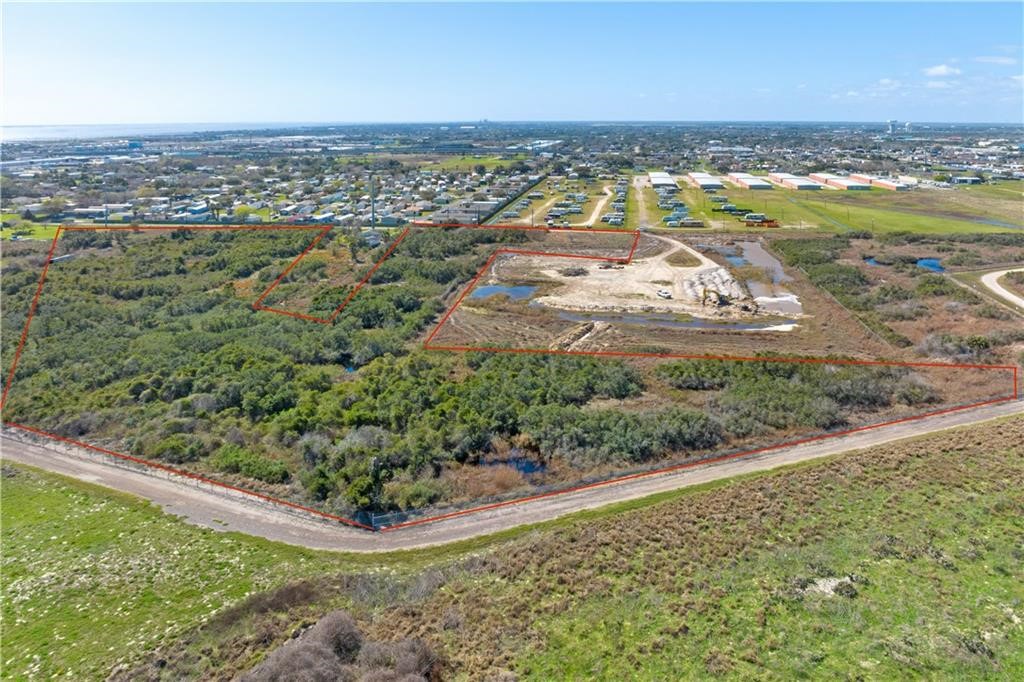 854 Jester Street Corpus Christi, TX 78418 - Photo 2 of 12 a view of a lake with a yard