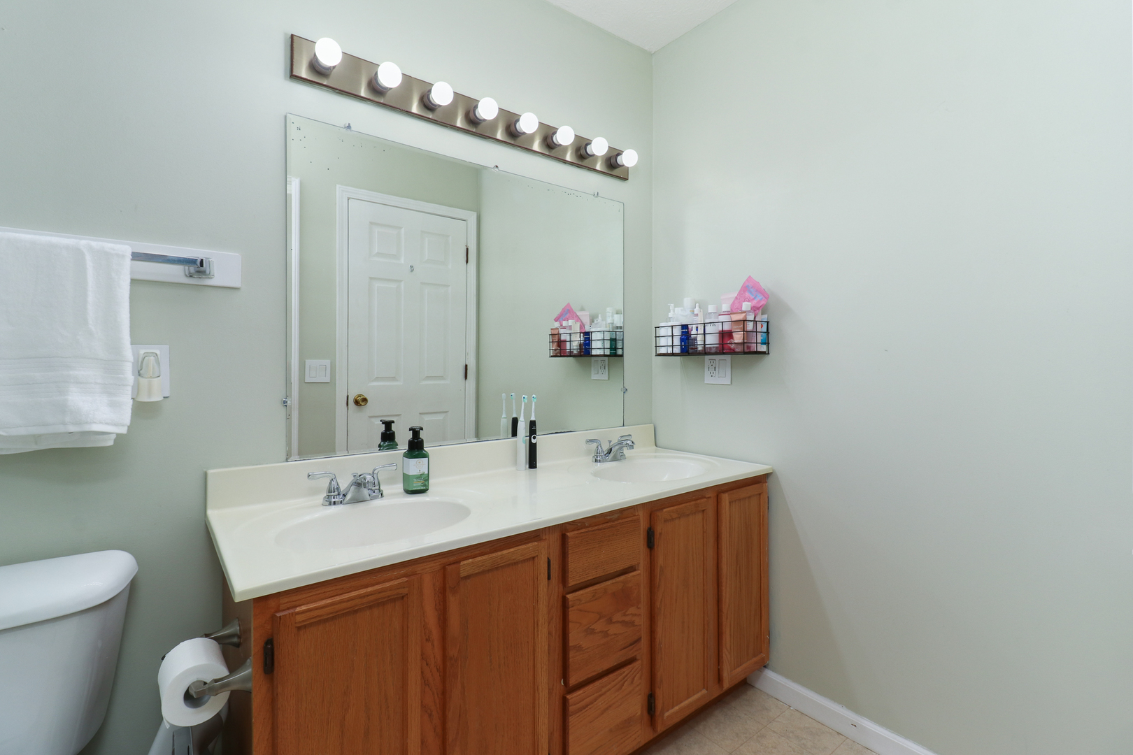 248 Parktrail Road Normal, IL 61761 - Photo 14 of 27 a bathroom with a sink and a mirror