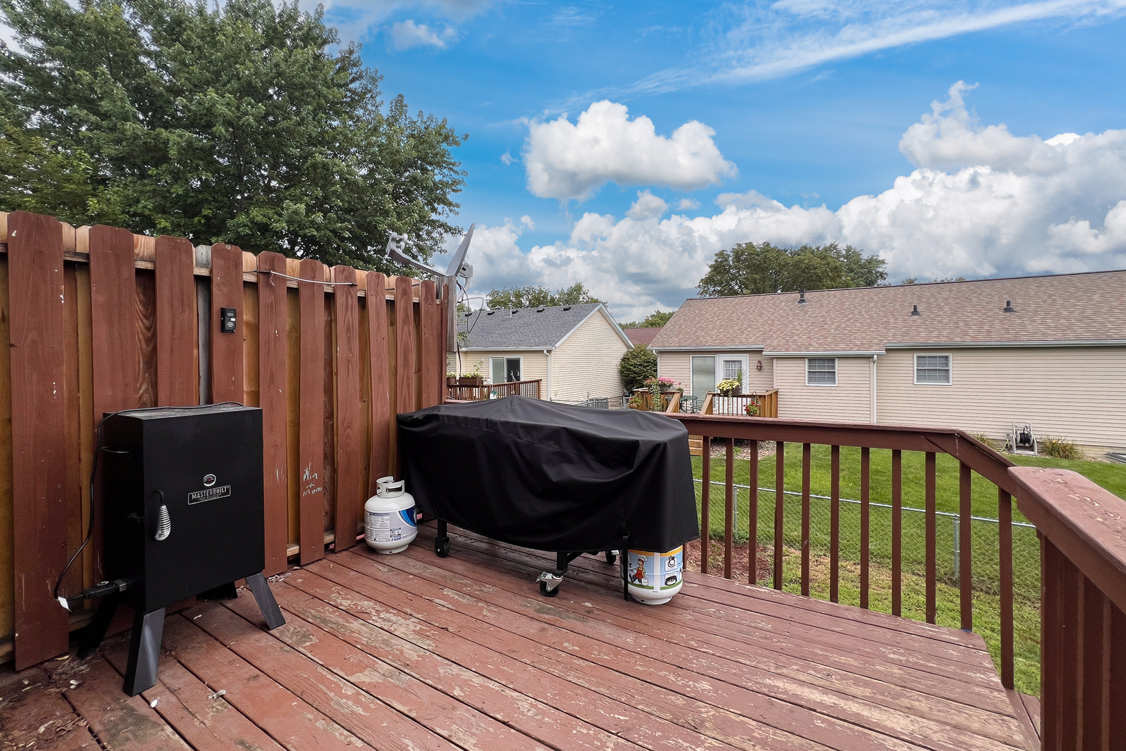 248 Parktrail Road Normal, IL 61761 - Photo 25 of 27 a view of a deck with wooden floor and fence