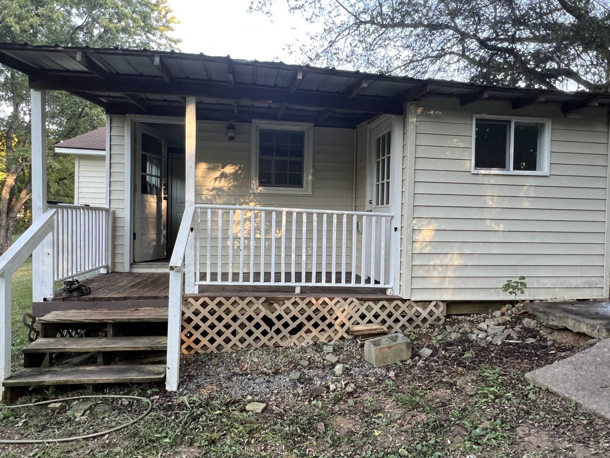 405 North 2nd Street Decherd, TN 37324 - Photo 11 of 11 a view of a house with wooden fence