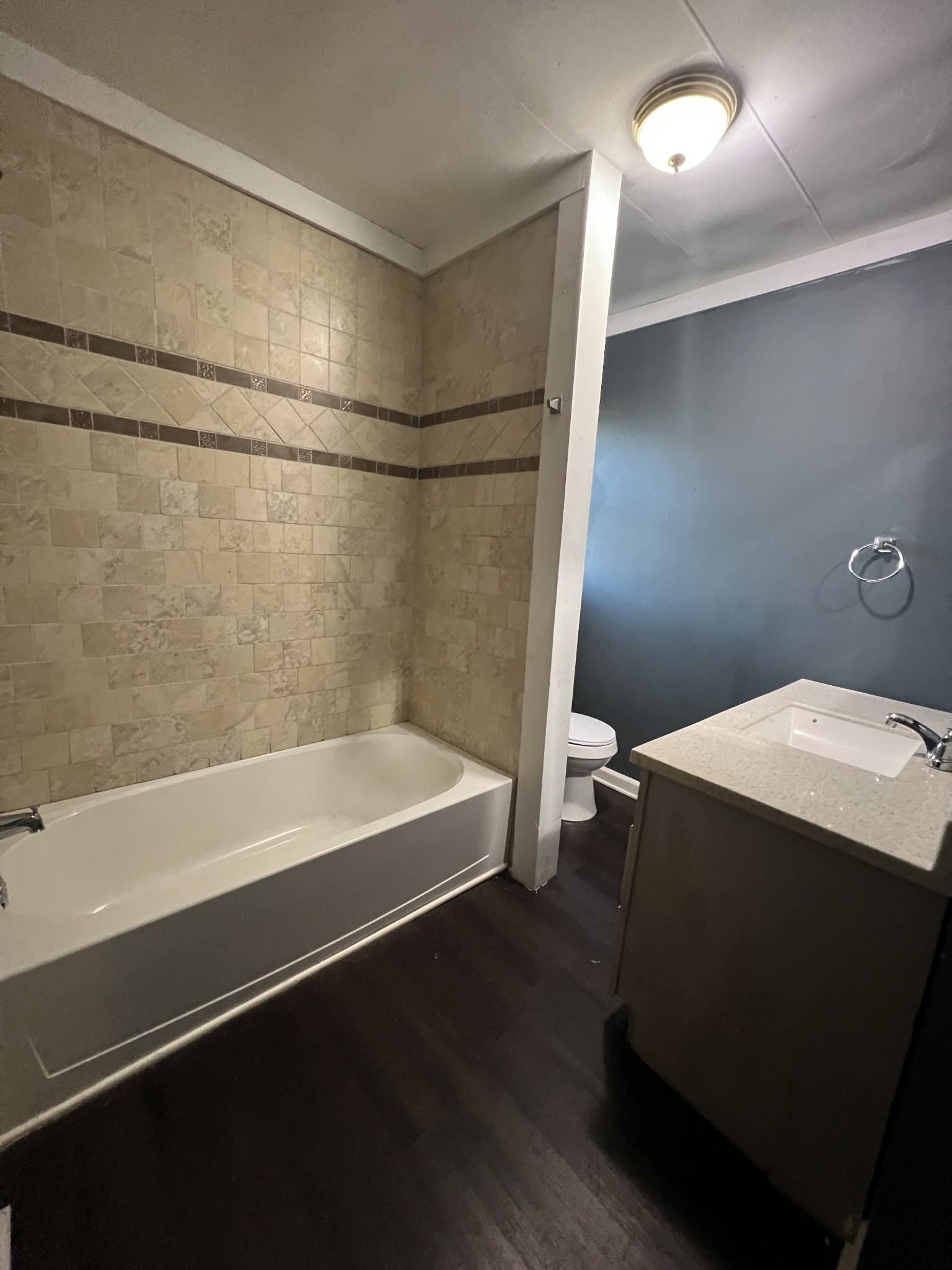 405 North 2nd Street Decherd, TN 37324 - Photo 6 of 11 a bathroom with a bathtub and a shower