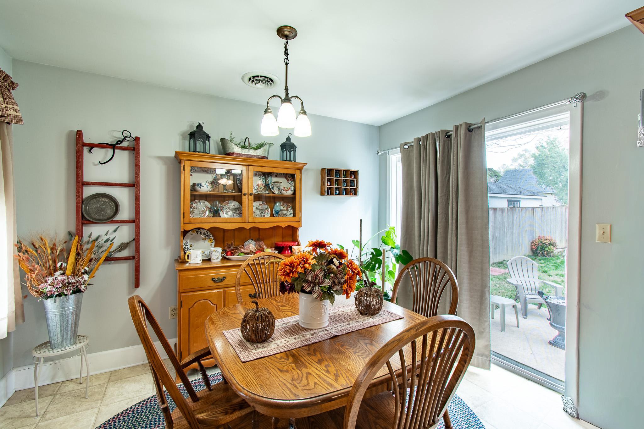 9 Oak Street Cambridge, MD 21613 - Photo 11 of 29 a view of a dining room with furniture window and outside view