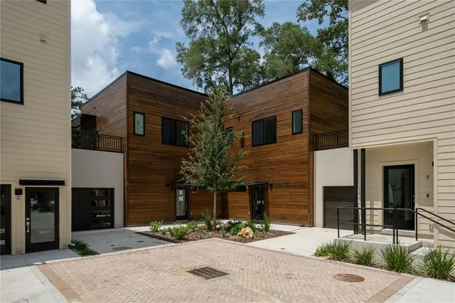 a front view of a house with yard