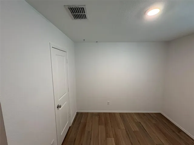 a view of small space with wooden floor