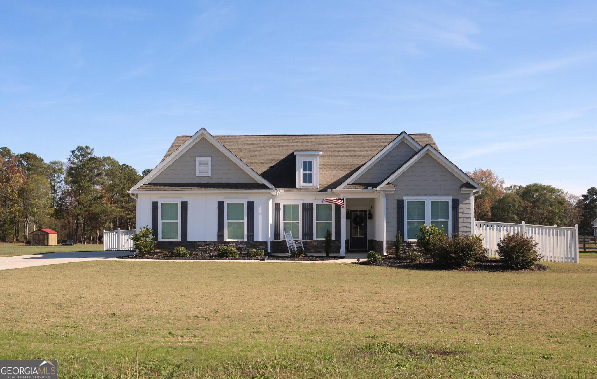 1540 Laboon Road Monroe, GA 30655 - Photo 1 of 1 a front view of a house with a yard