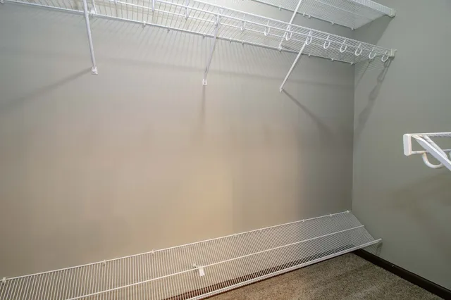 a view of a room with racks on the wall