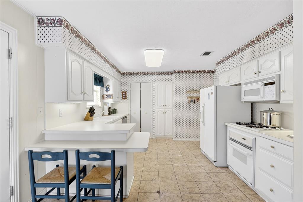 12118 Ridgefair Place Farmers Branch, TX 75234 - Photo 14 of 31 Digitally Enhanced Kitchen