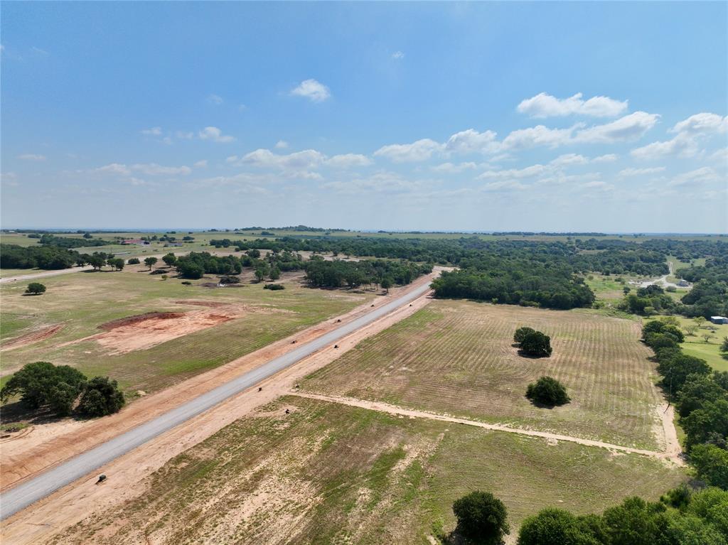 Lot 33 Colt Road Springtown, TX 76082 - Photo 2 of 12 a view of a swimming pool and lake