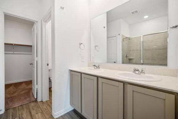 a view of an empty walk in closet