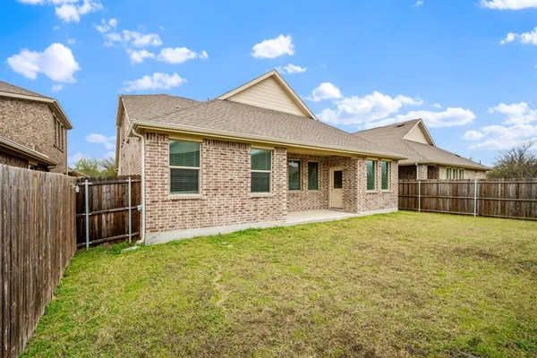 a swimming pool with wooden fence