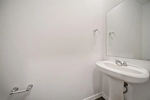 a view of kitchen with furniture and wooden floor