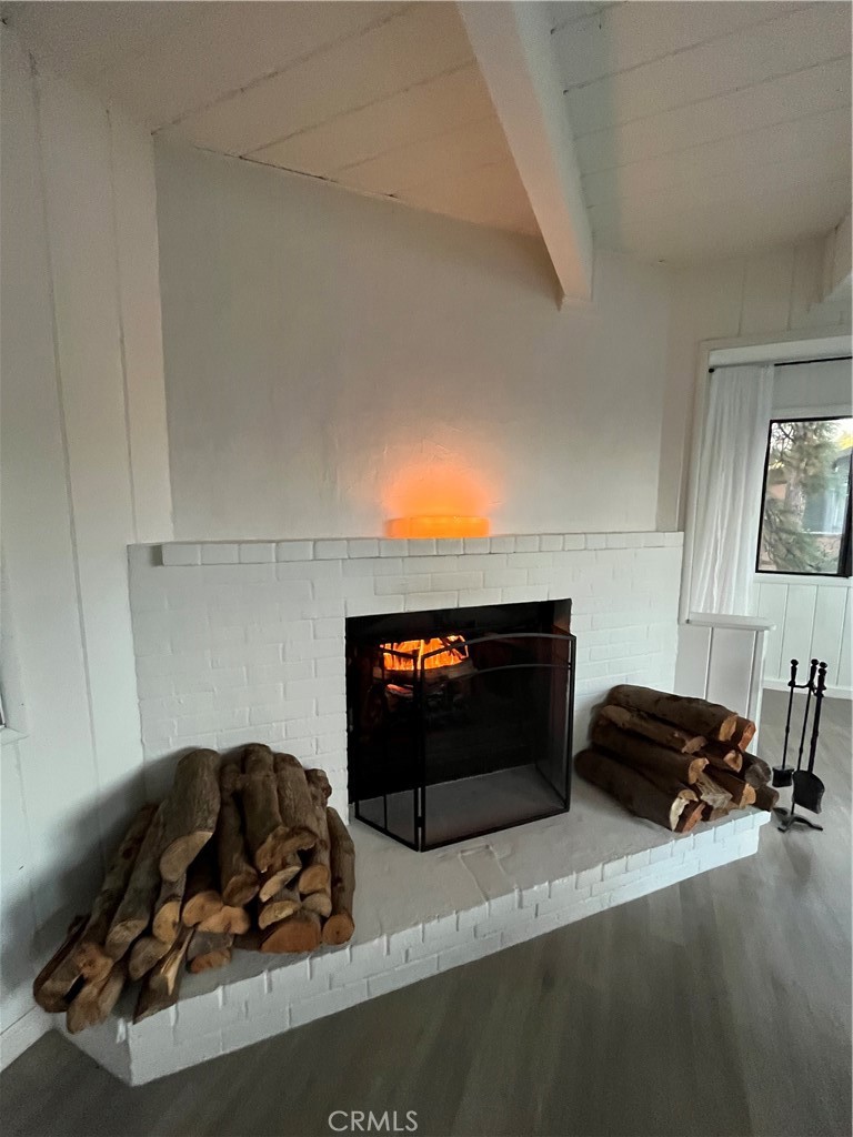 24875 Marion Ridge Drive Idyllwild, CA 92549 - Photo 13 of 47 a bedroom with a bed and a couch