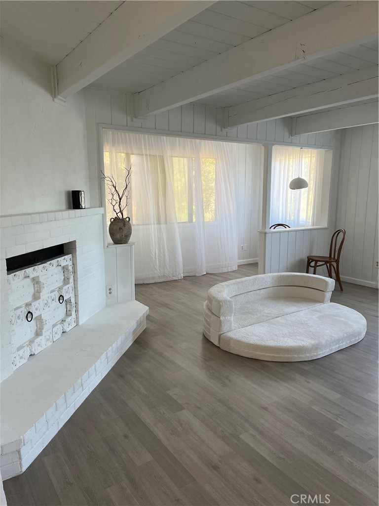 24875 Marion Ridge Drive Idyllwild, CA 92549 - Photo 14 of 47 a spacious bedroom with a bed a window and dresser