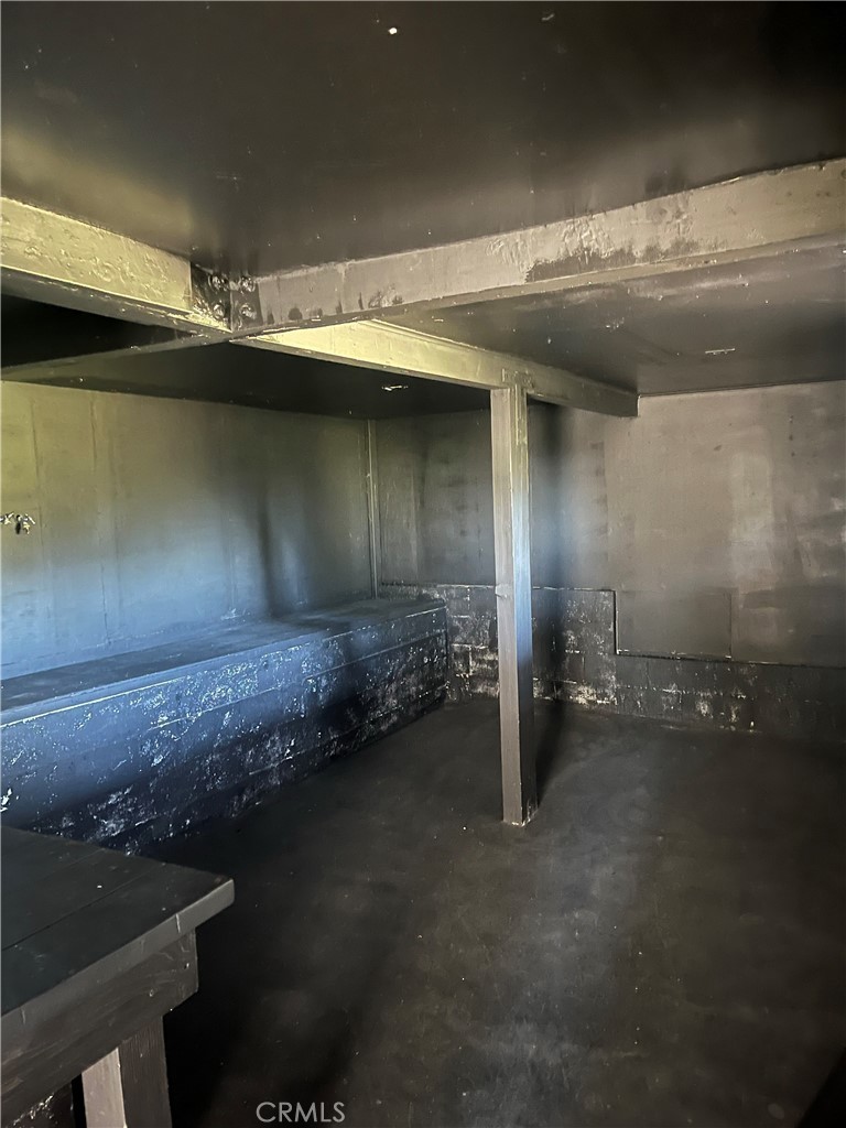 24875 Marion Ridge Drive Idyllwild, CA 92549 - Photo 4 of 47 an empty room with wooden floor