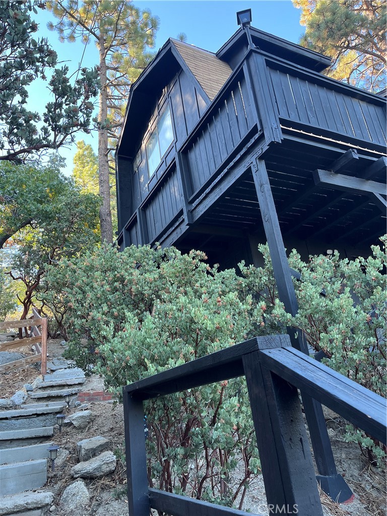 24875 Marion Ridge Drive Idyllwild, CA 92549 - Photo 5 of 47 a view of a balcony with wooden fence and floor