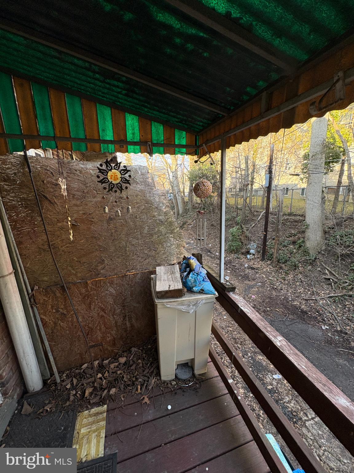 2419 Upland Street Chester, PA 19013 - Photo 23 of 27 Charming porch with rustic vibes and nature.