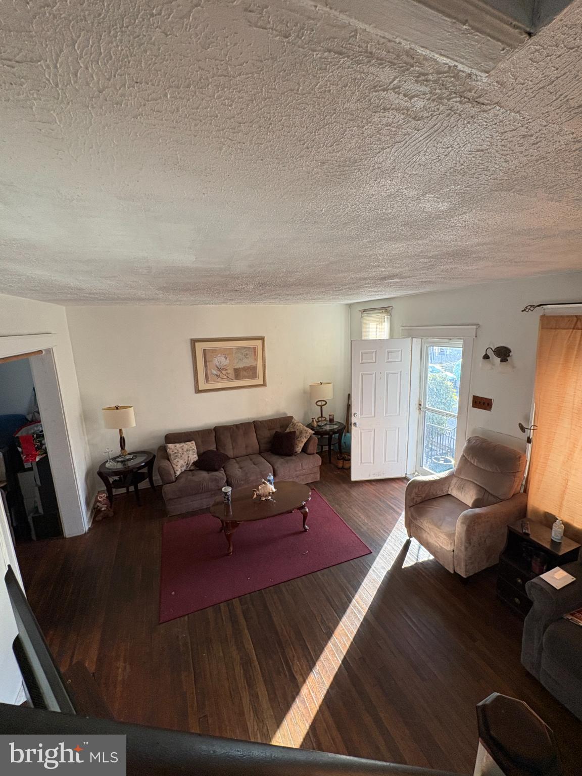 2419 Upland Street Chester, PA 19013 - Photo 7 of 27 Cozy living space with inviting natural light.