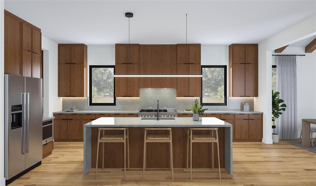 3989 Highgrove Drive Dallas, TX 75220 - Photo 3 of 8 a kitchen with stainless steel appliances granite countertop a refrigerator and a stove top oven