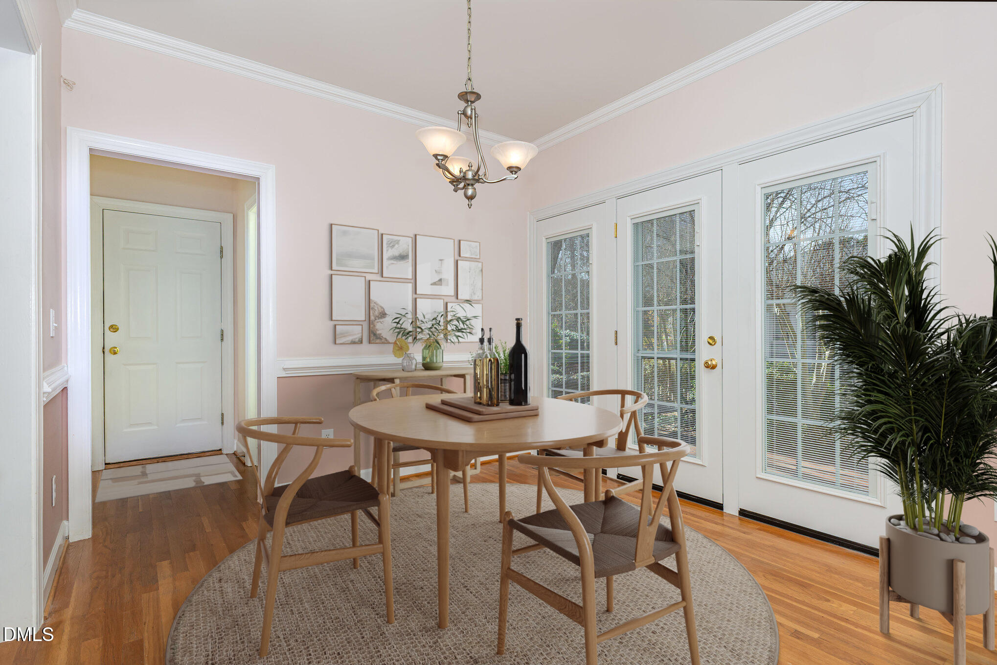 712 Hardimont Road Raleigh, NC 27609 - Photo 12 of 40 a view of a dining room with furniture window and wooden floor