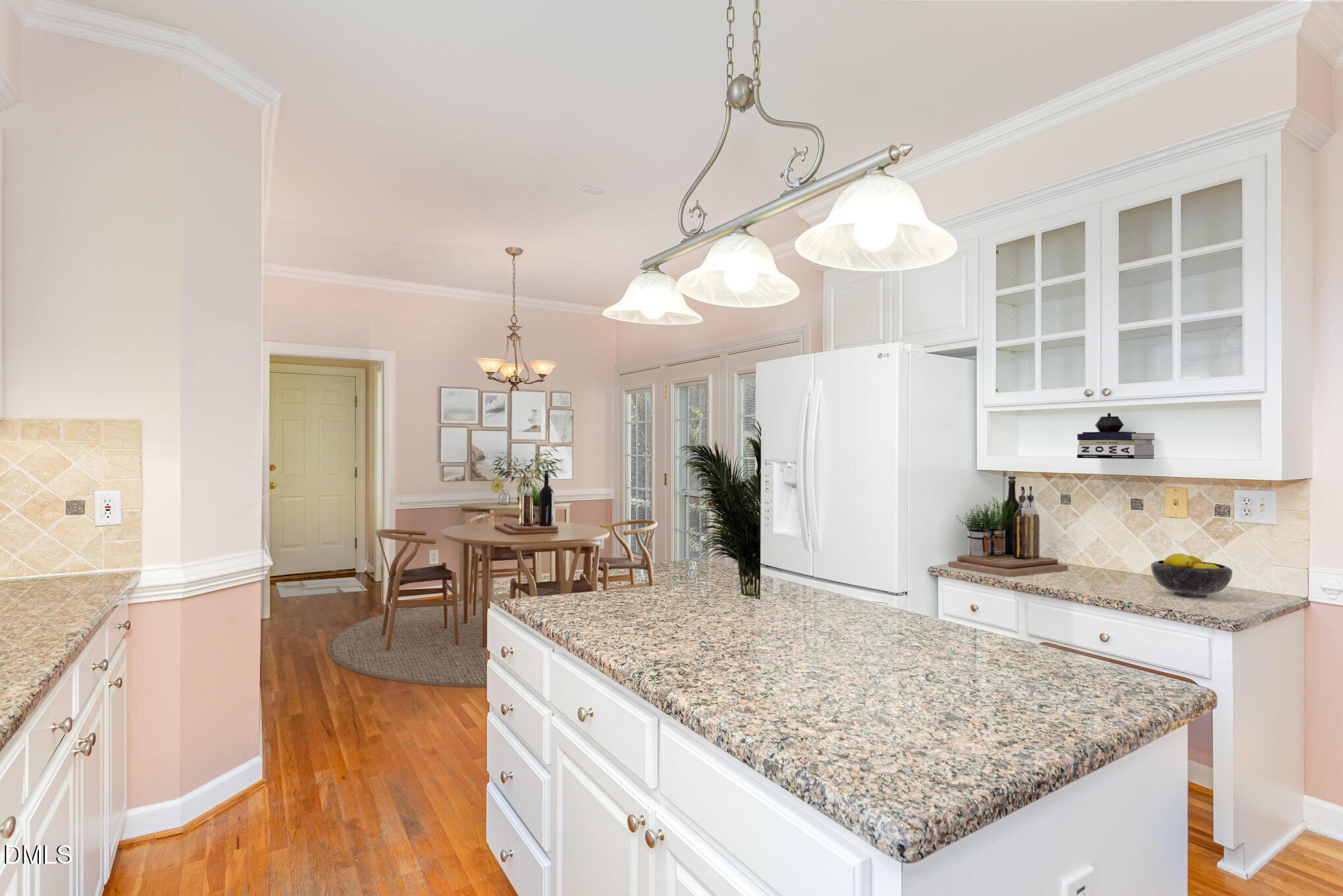 712 Hardimont Road Raleigh, NC 27609 - Photo 16 of 40 a kitchen with stainless steel appliances granite countertop a stove oven and a refrigerator