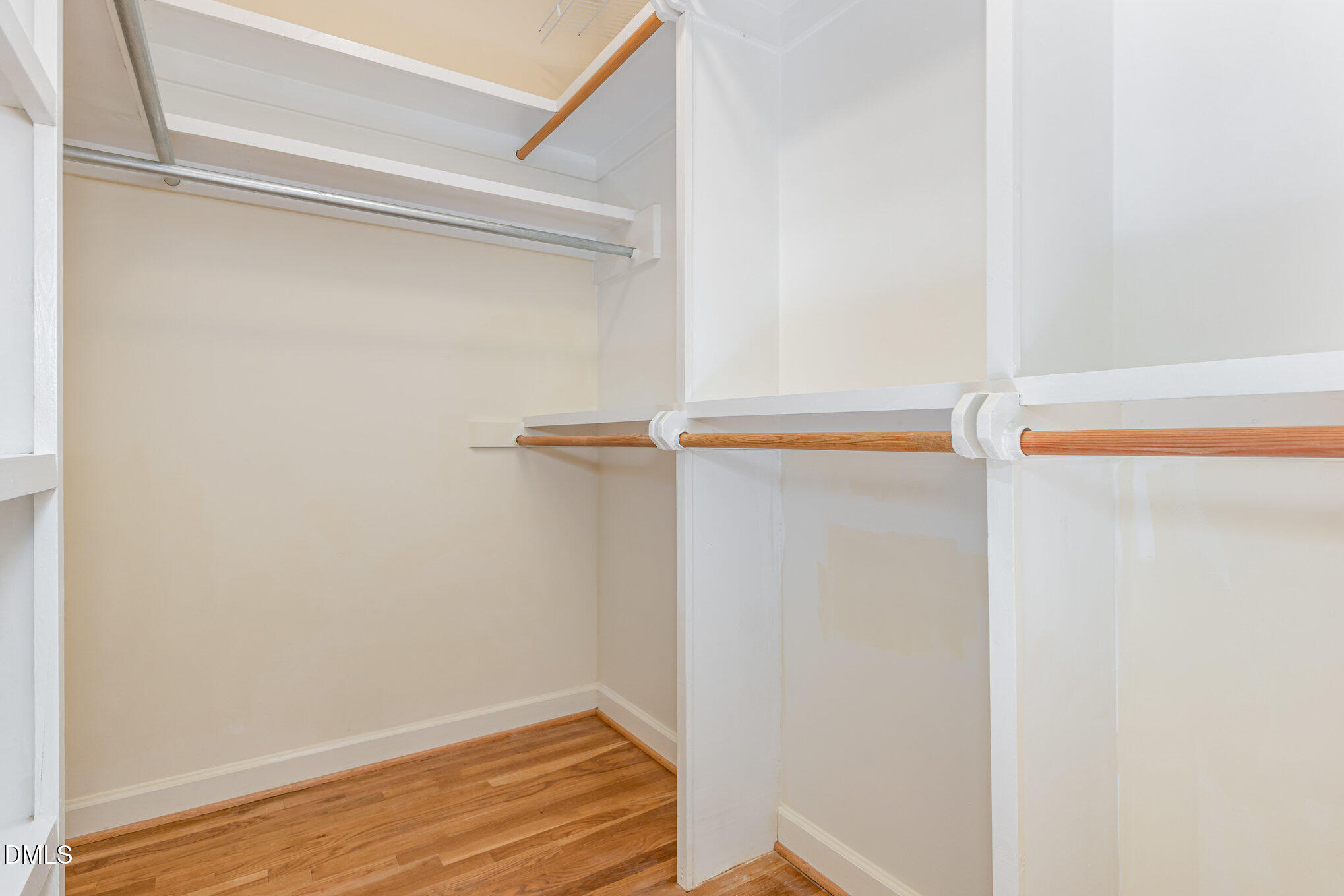 712 Hardimont Road Raleigh, NC 27609 - Photo 24 of 40 a view of walk in closet with empty racks