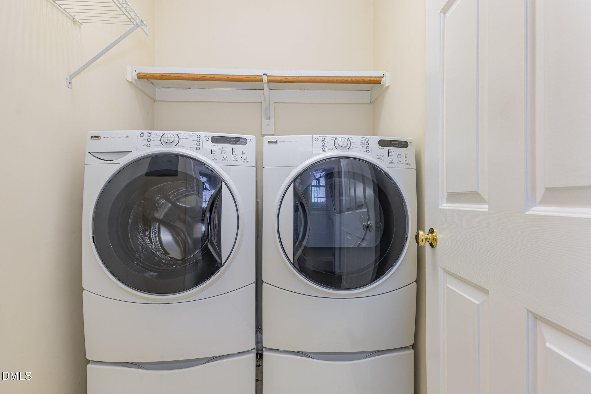 712 Hardimont Road Raleigh, NC 27609 - Photo 25 of 40 a utility room with dryer and washer