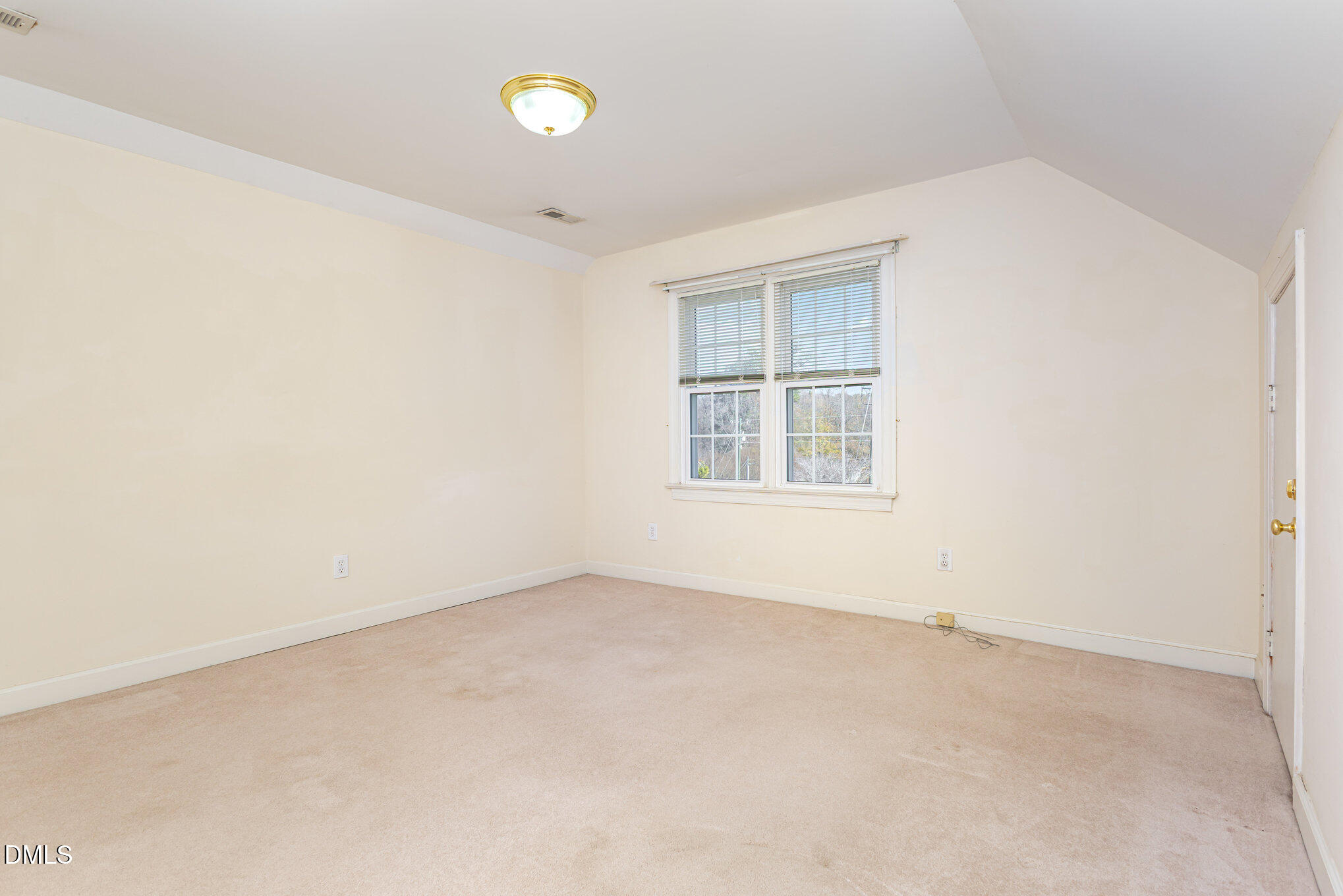 712 Hardimont Road Raleigh, NC 27609 - Photo 28 of 40 an empty room with windows