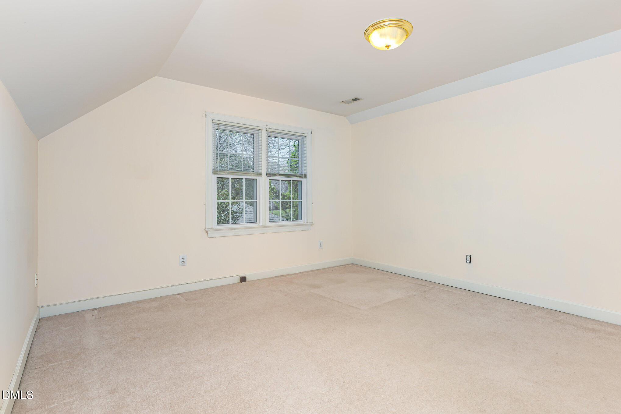 712 Hardimont Road Raleigh, NC 27609 - Photo 30 of 40 an empty room with a window